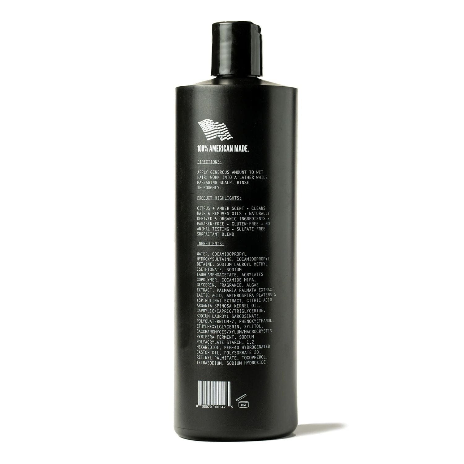 Back of Black bottle labeled with ingredients on a white background
