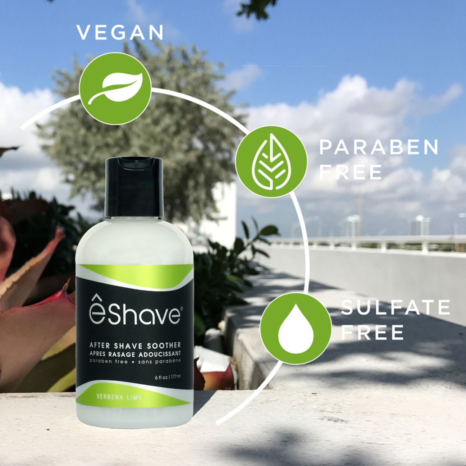 eShave after shave soother bottle with 'Vegan', 'Paraben Free', and 'Sulfate Free' labels outdoors.