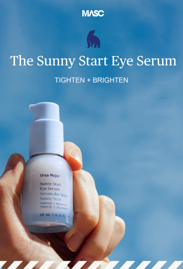 Hand holding a bottle of 'The Sunny Start Eye Serum' with a blue sky background