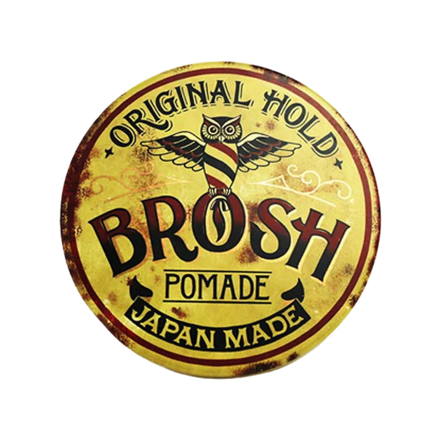 A round vintage-style metal tin label for Brosh Pomade, featuring a distressed yellow background with a central owl illustration and bold black lettering, isolated on a white background.
