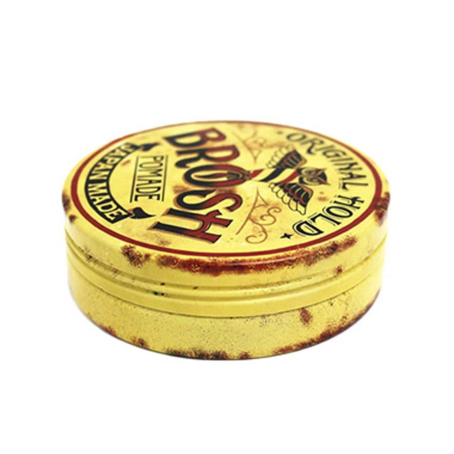 A round yellow metal tin of Brosh Pomade with a distressed, vintage-style design and dark red lettering, shown on a plain white background.
