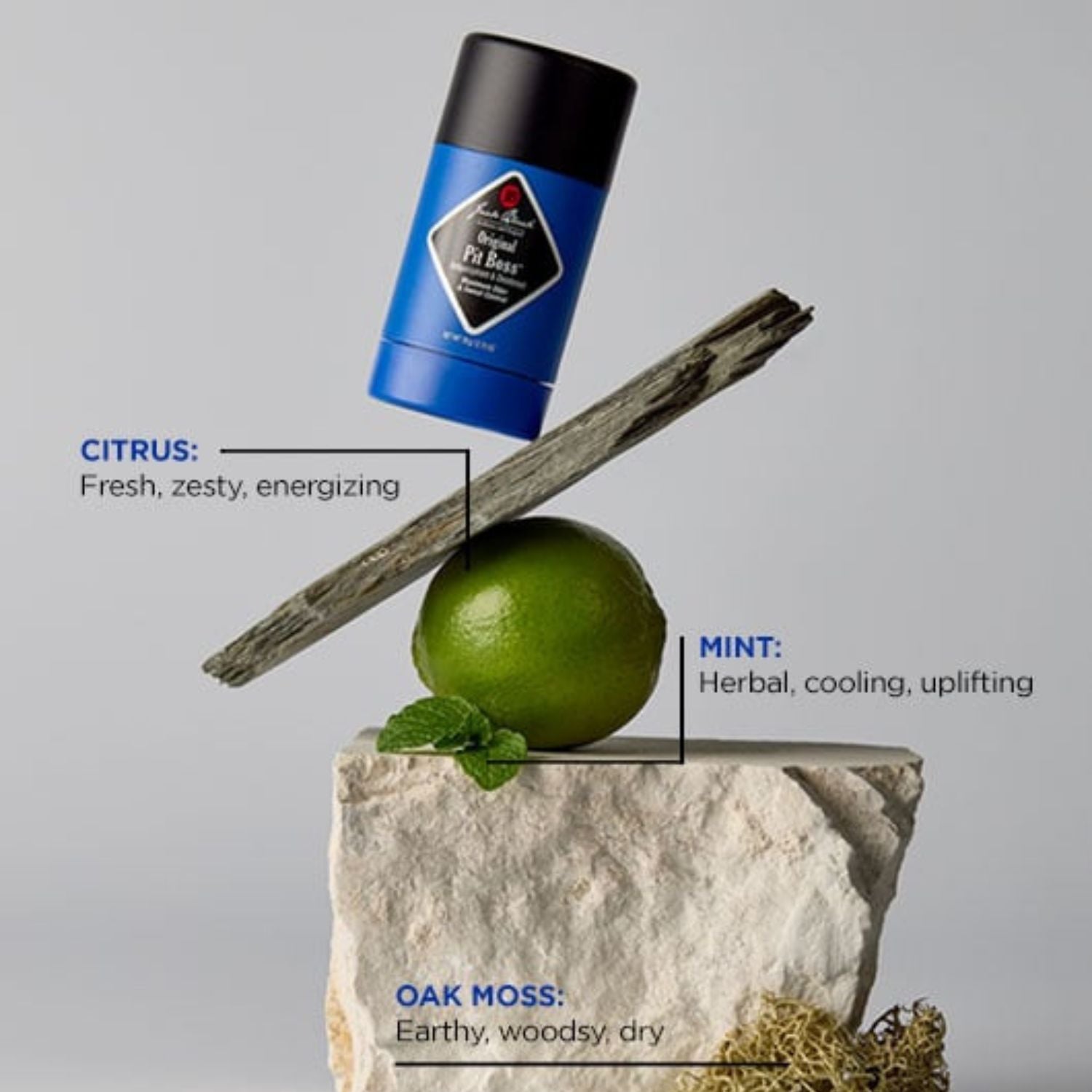 Blue deodorant stick with natural elements on a gray background