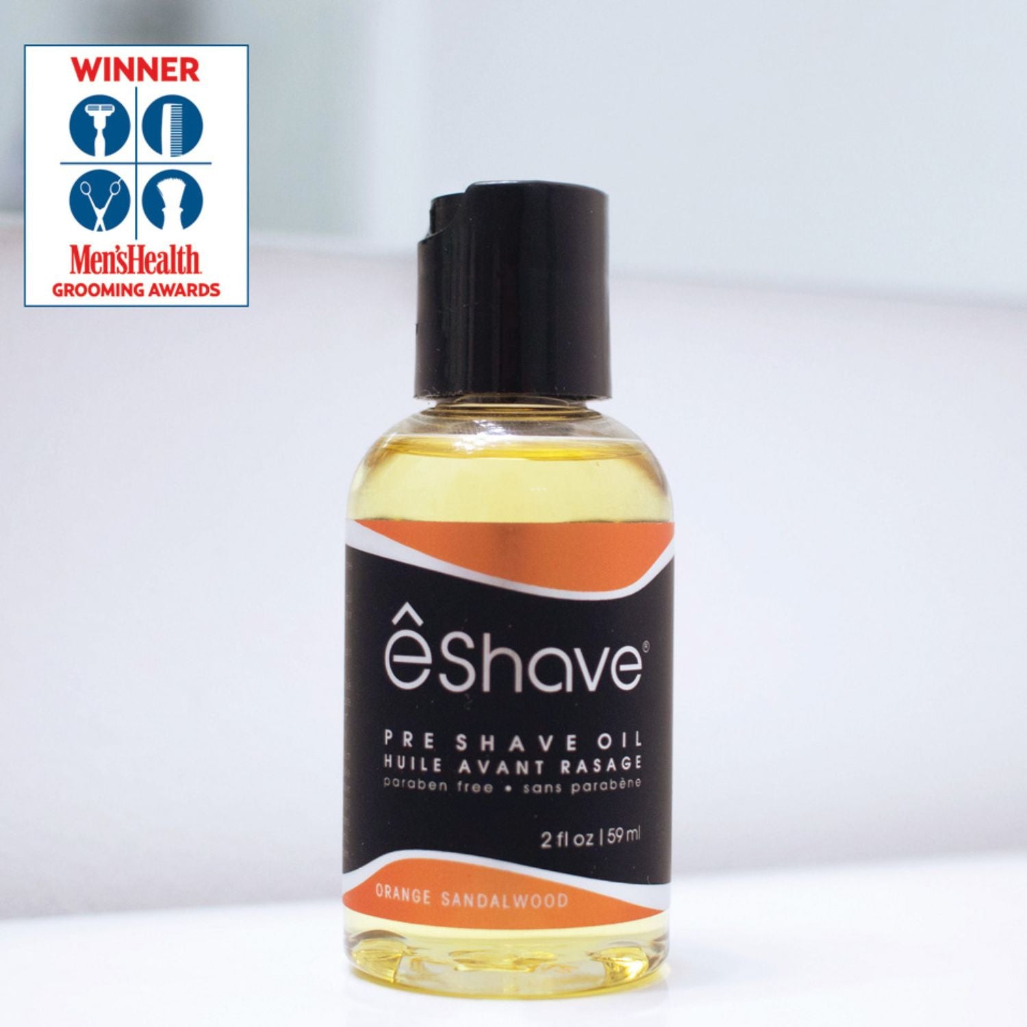 êshave pre-shave oil bottle with Men's Health Grooming Awards logo on a white background