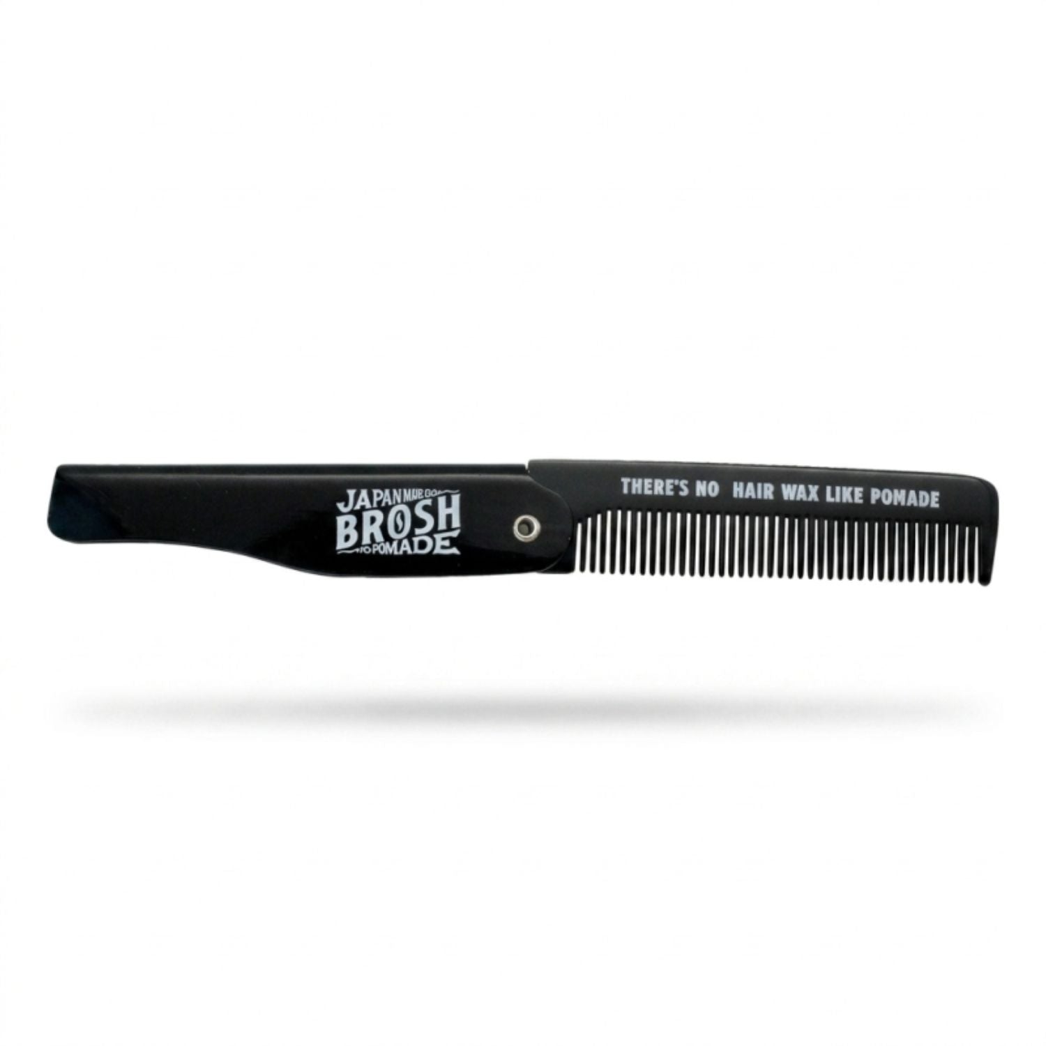 A black folding hair tool and comb with white printed branding and text, shown open against a plain white background.