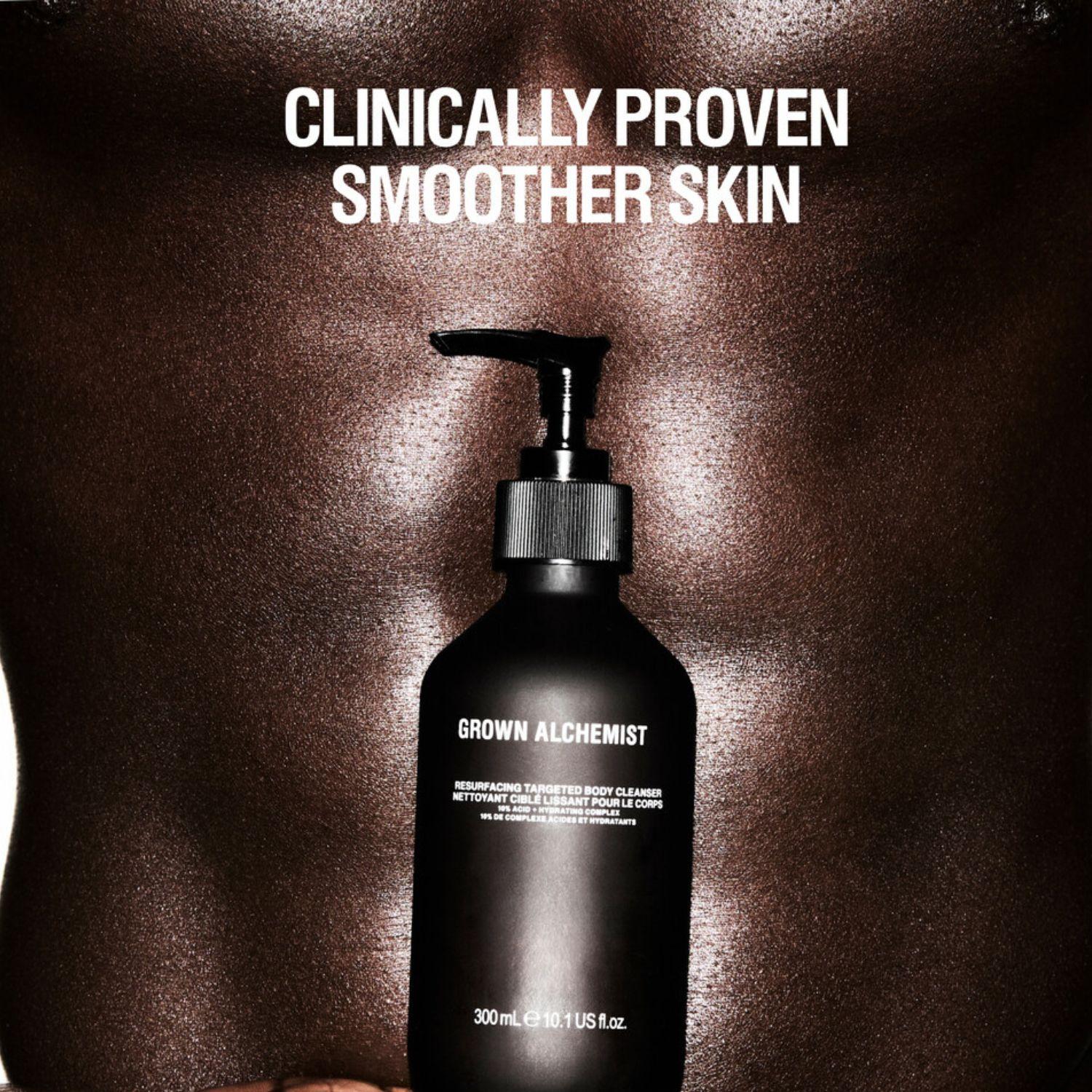 Black bottle with pump labeled 'Grown Alchemist' on a brown textured background with text 'Clinically Proven Smoother Skin'.