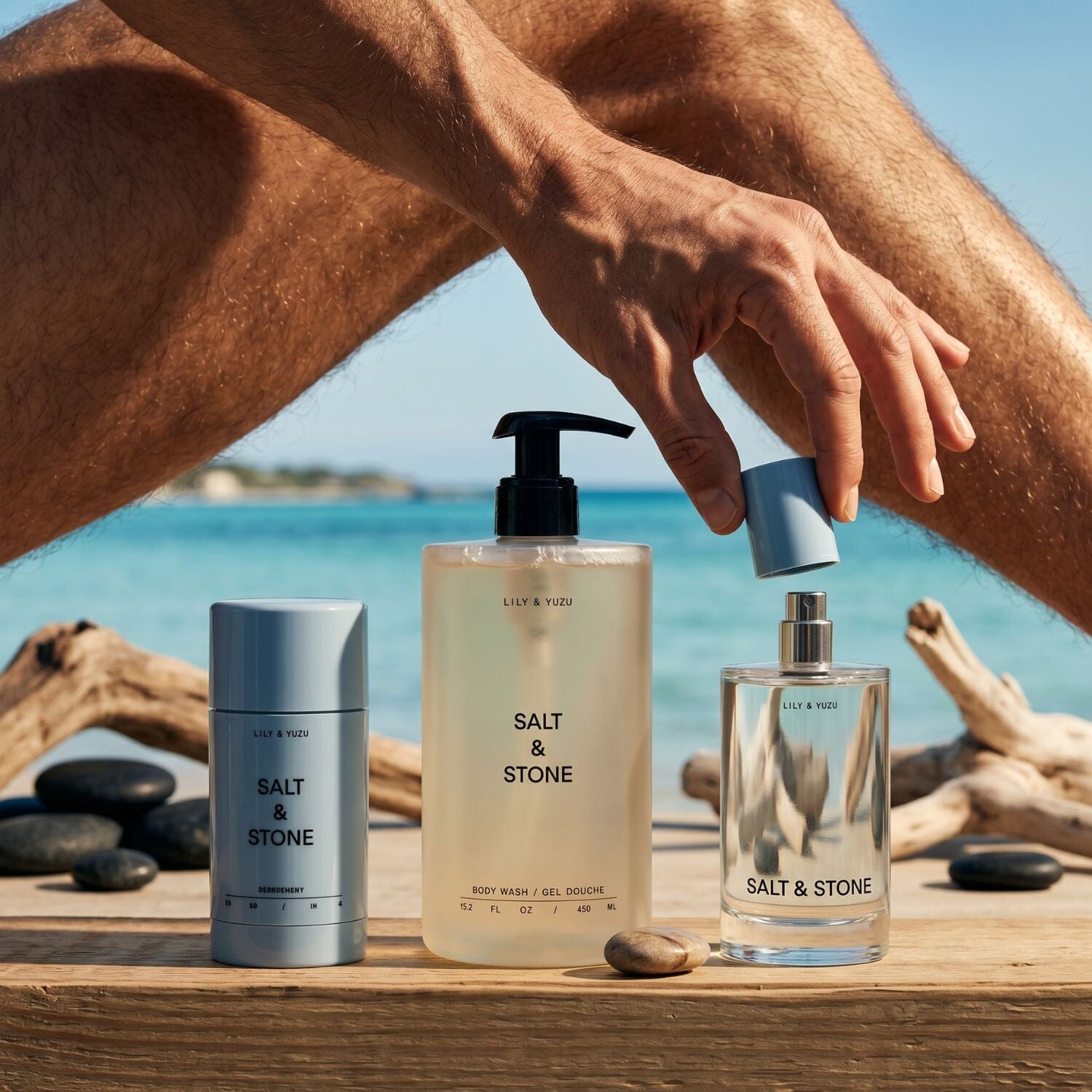 Person applying 'Salt & Stone' products on a beach setting