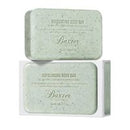 Two rectangular bars of Exfoliating Body Bar soap stacked vertically, showing their light sage green speckled surfaces and white packaging.