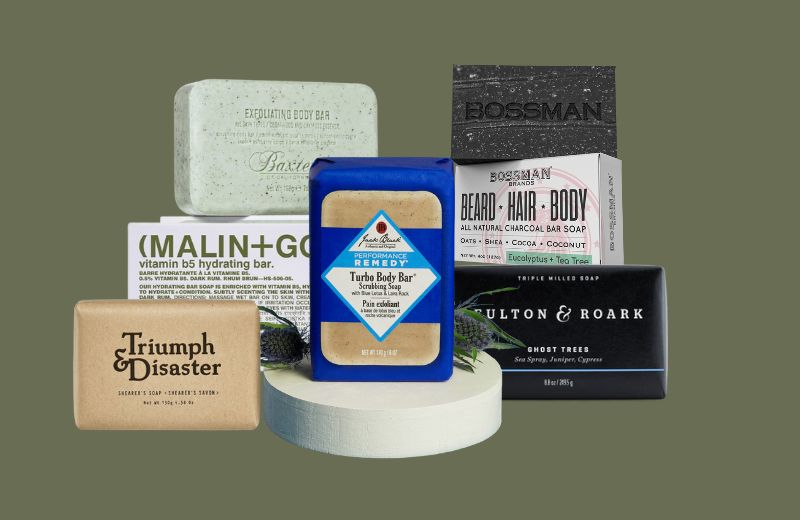 Collection of various bar soaps on a gray background