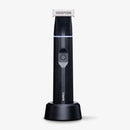 A sleek black electric shaver with a matching charging base, shown on a clean white background.