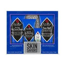 A boxed set of four face products in a blue retail package. The package contains four diamond-shaped black and red mask packets labeled Jack Black with a central badge reading 'Skin Saviors'.
